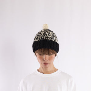 Hand knitted bulky pompom beanie in Black x Ivory