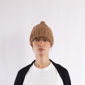 Hand knitted bulky pompom beanie in Camel