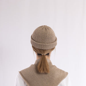 A simple shallow beanie in Taupe