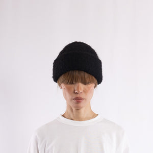 Baby alpaca mix purl stitch round top beanie in Black